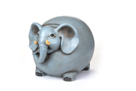 Decorated ceramic elephant on a white background