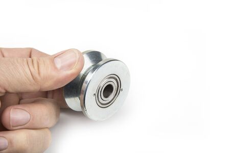 Heavy duty sliding wheel on bearings on a whiteの写真素材