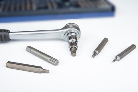 Ratchet with torx bits on a white background