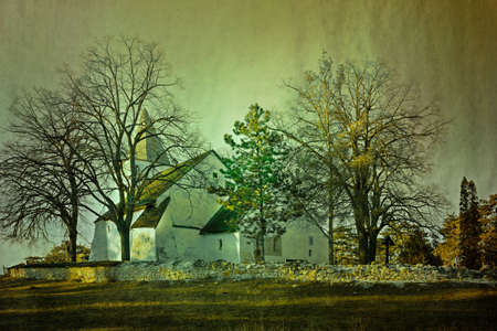 Old christian church on the hill in the morning on a grungy backgroundの写真素材