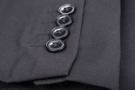 4 buttons on a man sleeve suitの写真素材