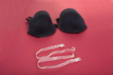 Silicone bra straps on a redの写真素材