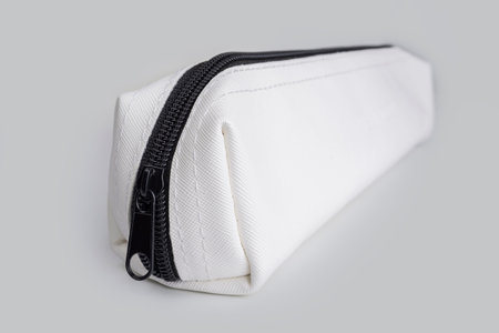 White stationery pouch with zipper on a white