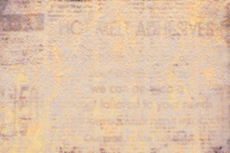 Newspaper with old grunge vintage unreadable paper texture backgroundの写真素材