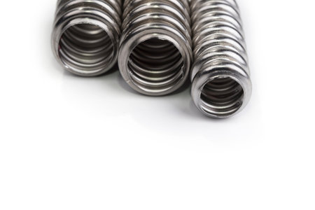 Steel flexible hoses for a boiler on a white