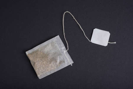 Hearbal Tea bag on a black backgroundの写真素材