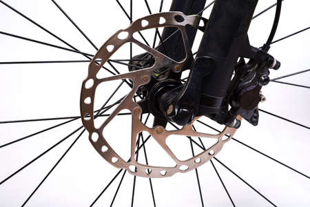 Mountain bicycle front disc brake on a whiteの写真素材