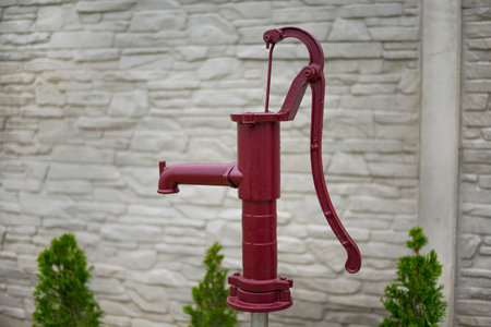 Well hand pump in the gardenの写真素材