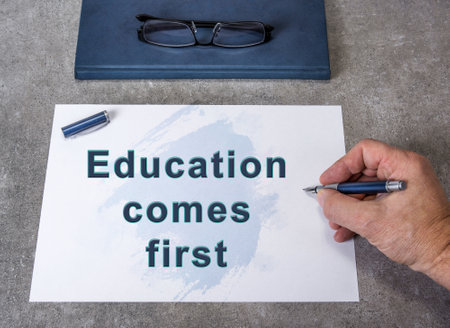Education comes first. Motivational sign for young peopleの写真素材
