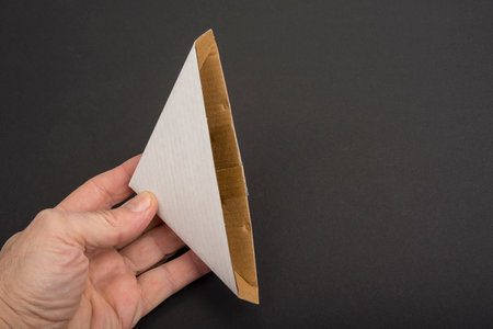 Paper Edge Corner Protector on a black. Protection In Packagingの写真素材