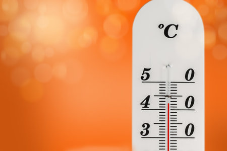42 degrees celsius on a thermometer. Global warming conceptの写真素材