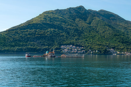 Turquoise water at Perast bay. Our Lady Of The Rocks And The Island Of Saint Georgeの写真素材