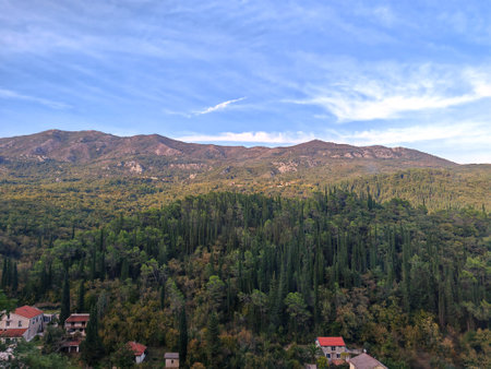 A picturesque mountain landscape with scattered housesの写真素材