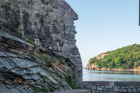 Budva end of the city walls and layers of the stoneの写真素材
