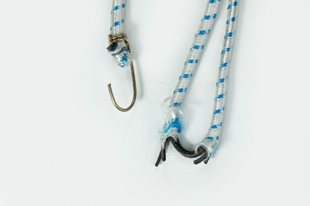 Broken Bungee rubber rope with hooksの写真素材