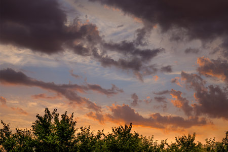 Stormy sky at the sunset.の写真素材
