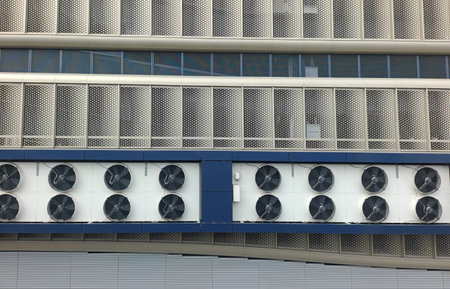 Air conditioners on the bottom of the apartment buildingの写真素材