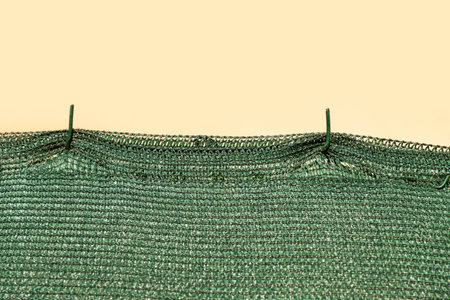 Fabric Shade cloth on a fence for a privacyの写真素材