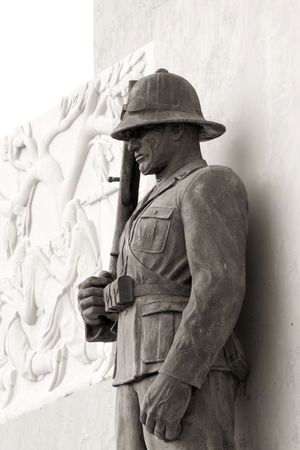World war monument soldier is a photo of a monument dedicate to fallen in Africa war. It is a Sicilian monument in Siracuse city.の写真素材