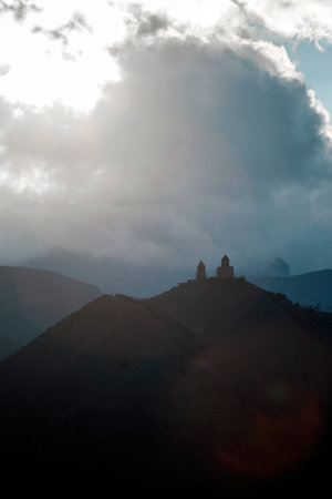 Church at dawn on mount Georgia, Kazbek