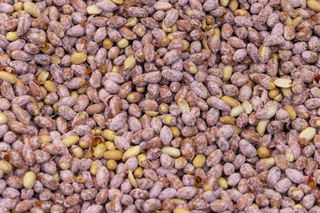 Peanut in sugar, background, textureの写真素材