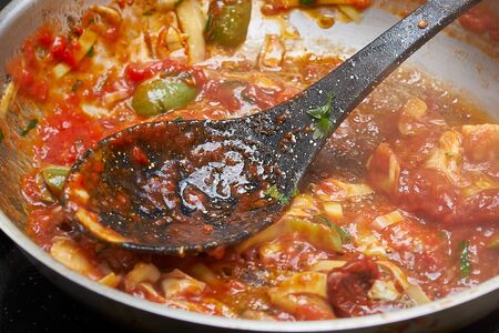 Cooking sauce for pasta in frying pan. close up photoの写真素材