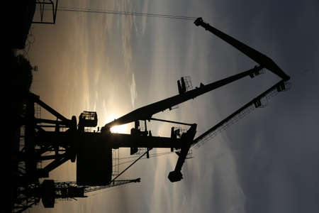 Port crane for work in the sunsetの写真素材