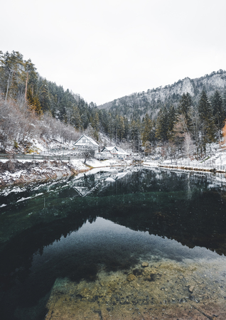 Winter Christmas Landscape With Calm Winter lake, Beautiful Frozen lake With Reflection In Water in lower Austriaの写真素材