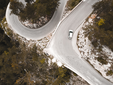 Road in the autumn forest aerial view in lower austriaの写真素材