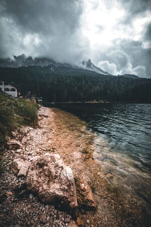 Great view of the foggy lake Antorno in National Park Tre Cime di Lavaredo. Location Auronzo, Misurina, Dolomiti alps, South Tyrol, Italy, Europe. Vintage style.の写真素材