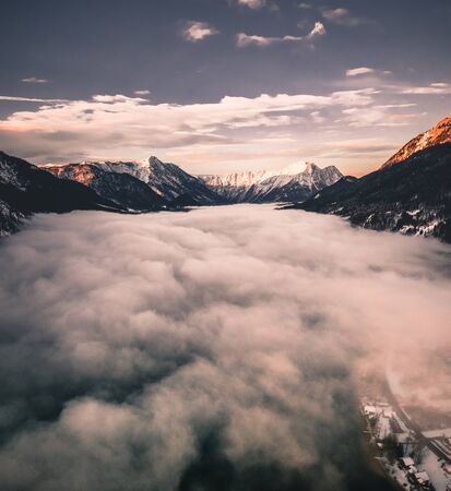Mountain and Lake Winter Landscape at the Grundlsee in Austria Aerial Viewの写真素材