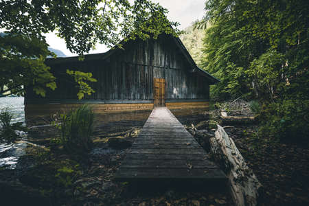 wooden fishing hut at lake toplitzsee in austriaの写真素材