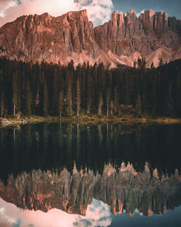 Carezza lake Lago di Carezza and Mount Latemar in Dolomites Alps Italy in Summerの写真素材