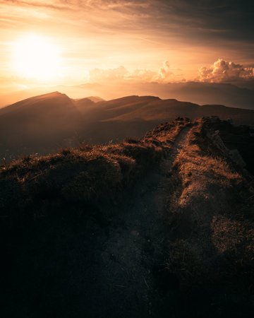 Mountains under sunset light, as seen from Cinque Torri, Dolomite Alps, Italyの写真素材