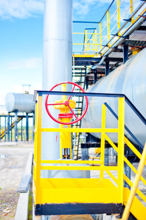 Oil and gas field. Gate valves that control the flow of gas from wells