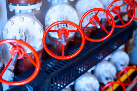 Oil and gas field. Gate valves that control the flow of gas from wellsの写真素材