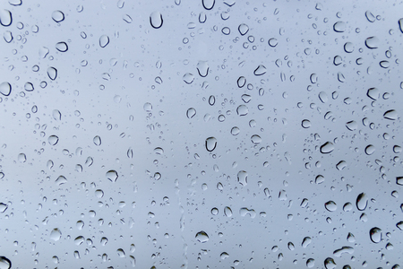 Raindrops on window glass on the windshield.の写真素材