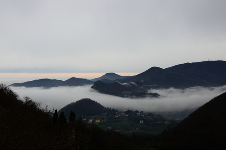 Hills through the fog, the Euganean hills Padua Veneto Italyの写真素材