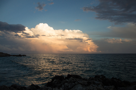 Sunset over the sea in the Bay of Sirens Marina di Camerota Campania Italyの写真素材