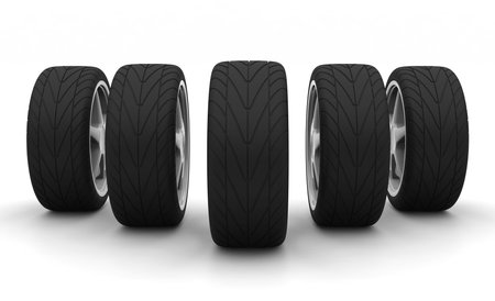 Perspective view of five new car wheels isolated on the white background. Front view