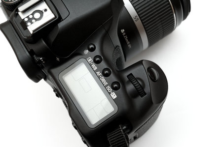 Professional Digital Single Lens Reflex Camera isolated on white