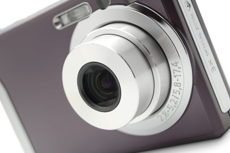 Digital compact photocamera isolated on white background
