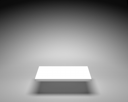 Empty white shelve on grey background in bright illuminationの写真素材