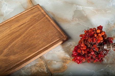 Gray concrete stone background texture with cutting board.の写真素材
