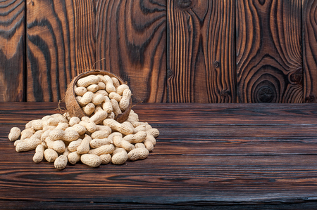 peanuts on wood backgroundの写真素材