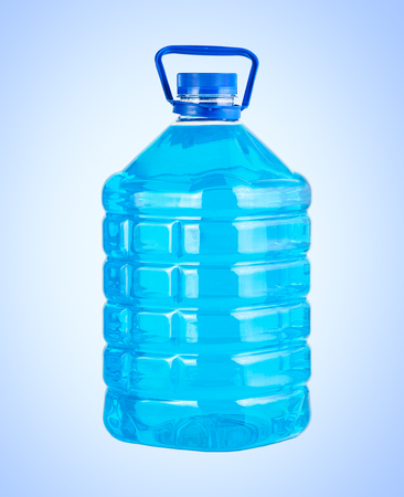 Big plastic bottle blue liquid water isolatedの写真素材