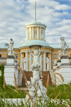 Moscow Oblast, Russia - August 26, 2016: Fountain Cupid with dolphins on the path from the Grand Palace to the Park of Arkhangelskoye estate. The object of the cultural heritage of the Russian Federation 5010216000. Moscow Oblast, Russia.のeditorial素材