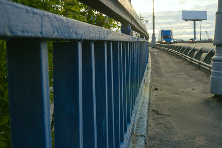 Blue fence on the bridge closeupの写真素材