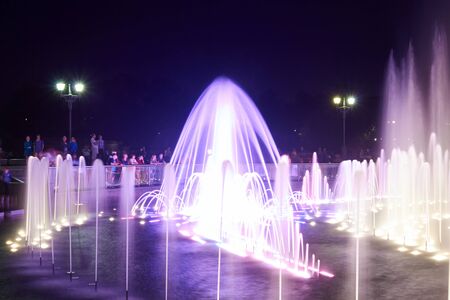 View of musical and multicolored fountain water show at Tsaritsyno Park at night, Moscow, Russia.の写真素材