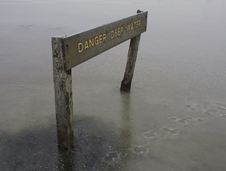 Danger Deep Water Sign for Frozen Lakeの写真素材